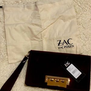 Zac Posen handbag wine purple gold accents clutch loop spacious interior DTN